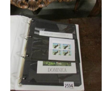 An album of bird related stamps, first day covers, block, sheets, some mint and a folder of Channel Islands stamps.