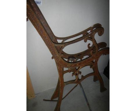 A pair of old cast iron bench ends.