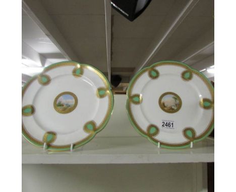 A pair of Minton cabinet plates with hand painted scenes in centres.