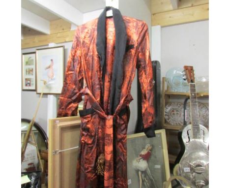 A vintage oriental silk robe.