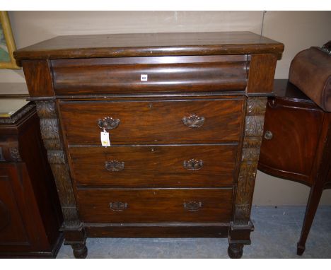 A Victorian stained wood small Scotch chest of drawers, the top drawer with shaped front over three deep drawers with oxidise