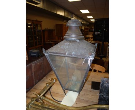 A 19th Century copper square-shaped tapering former street lamp, converted to electricity, complete with a wrought iron wall 