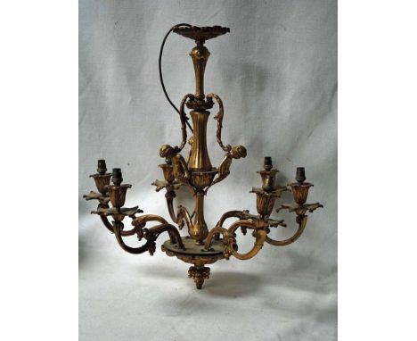 A late 19th/early 20th century cast and gilt brass six light Chandelier, the sconces as flowers and leaf drip trays, on S scr