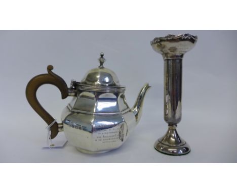 George V silver presentation teapot, Birmingham 1921 together with a Walker and Hall, Sheffield silver candlestick, 1930 (2) 