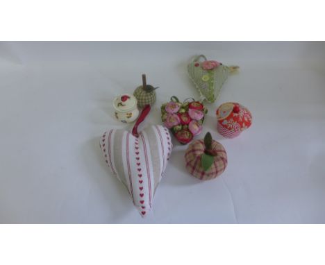 A quantity of cotton and linen heart shaped hanging pendants and an enamel mug and a vintage style wall clock, etc (a lot) 