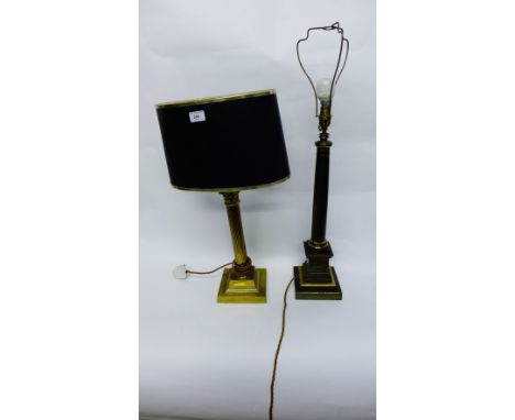 A Corinthian brass table lamp complete with shade and a bronzed effect table lamp 