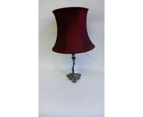 A silver plated table lamp and shade
