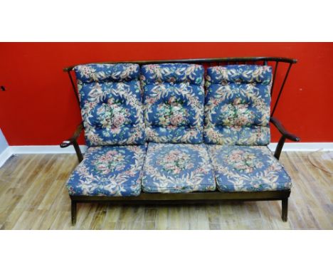 An Ercol style three seater sofa