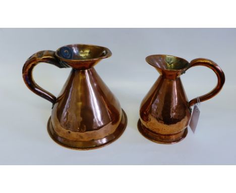Two copper harvest jugs, pair of brass candlesticks, copper pot and a green table ware and planter (6) 