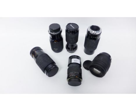 A collection of six camera lenses to include a Carl Zeiss Jena etc 