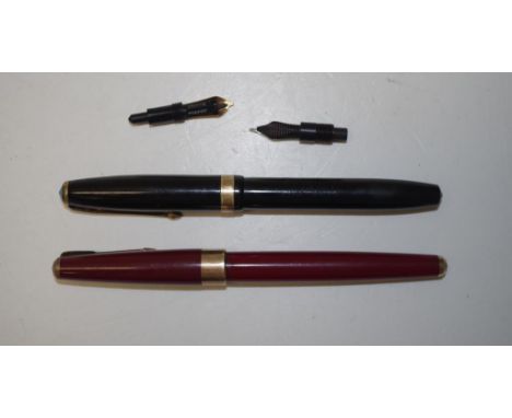 Two vintage fountain pens comprising a Conway Stewart with a 14k nib, and a Parker with 2 extra nibs