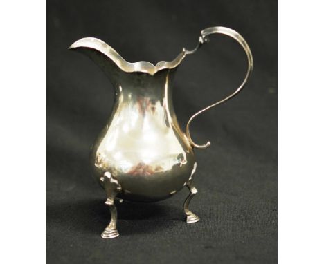 George III sterling silver cream jug London 1775, maker Walter Brind, (height 12cm; weight 100grams approx).