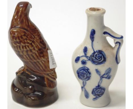 Two ceramic novelty miniature bottles of alcohol including Beswick eagle with Ben Eagles Scotch Whisky and another