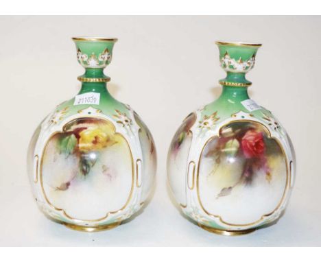 Pair of Royal Worcester Hadley ware vases with handpainted ornate rose decorated panels and in relief decorated borders. Circ
