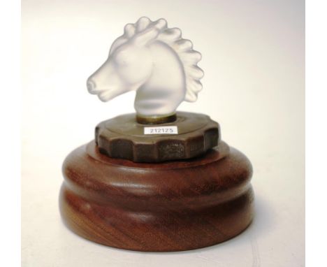Vintage glass horse head car mascot mounted on a timber base, height 12.5cm approx