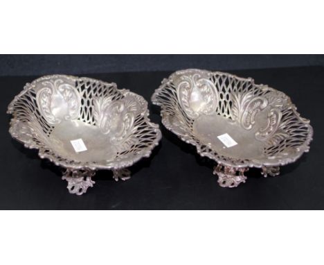 Two Victorian sterling silver bonbon dishes hallmarked London 1892. Pierced sides, 18.5cm wide, 4.5cm high. 300gms together.