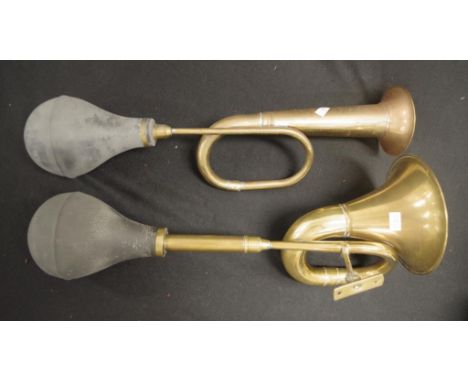 Two brass automobile horns
