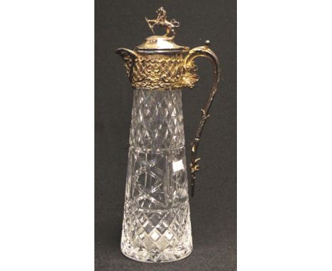Silver plate &amp; cut crystal claret jug with in relief figural spout, grape decoration to handle, and lion finial to lid (p