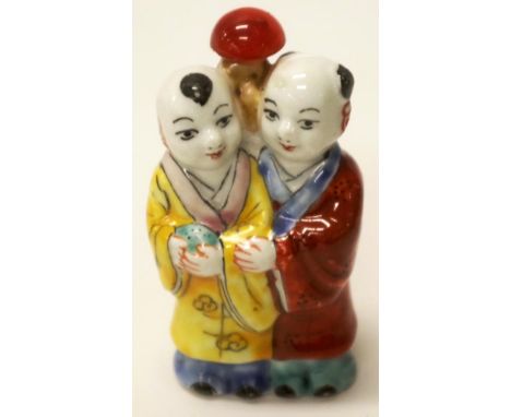 Chinese painted figural ceramic snuff bottle decorated with standing couple in robes, decorative stopper, (height 7cm approx)