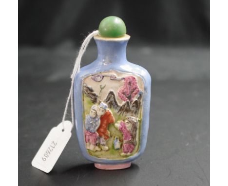 Chinese painted ceramic snuff bottle figural form painted bottle, with green hard stone  inset stopper, (height 9cm approx).