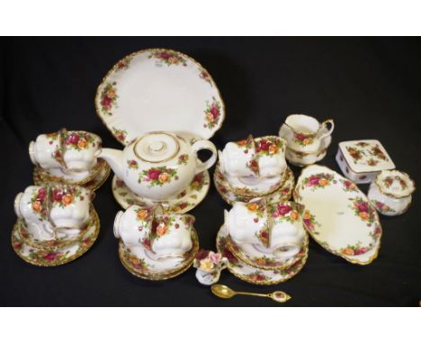 Extensive Royal Albert "old country rose" teaset comprising 10 cups, 9 saucers, 9 plates, 2 serving plates, lidded trinket bo