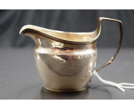 Georgian sterling silver cream jug hallmarks rubbed, (Georgian head visible), (height 9cm; weight 106grams approx).