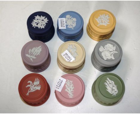 Nine Wedgwood Jasperware"Australia"  trinket boxes all with various Australian flower motifs and colours, all in original box