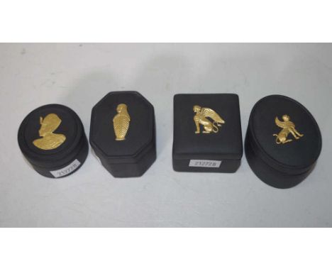 Four Wedgwood black basalt Egyptian trinket boxes with four gold gilt Egyptian motifs to lids, including Tutankhamen, Griffin