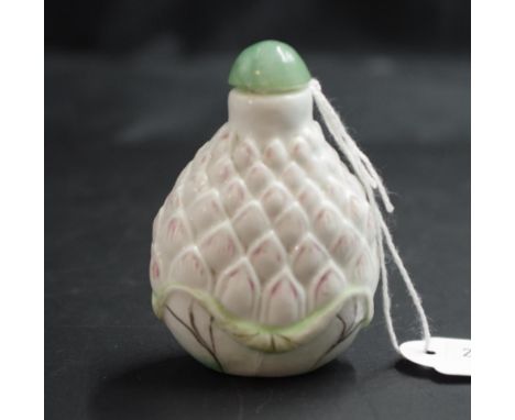 Chinese painted ceramic snuff bottle blossom form painted bottle, with green hard stone  inset stopper, (height 7cm approx).