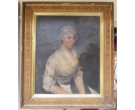 An ornate gilt framed mid 19th Century oil on canvas portrait of a woman, unsigned. 74cm x 60cm