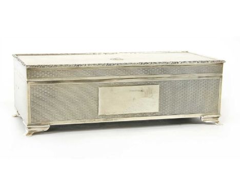 A modern engine turned silver cigarette box, by JR, Birmingham 1970. 21cm long