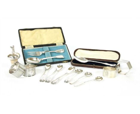 A collection of silver items, to include various flatware, napkin rings and cased examples (qty)