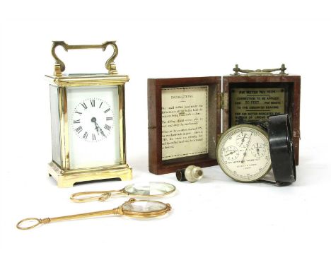 A brass carriage clock , together with two gilt metal lorgnettes and a cased Negretti and Zambra Air Meter engraved `T.S.S. L