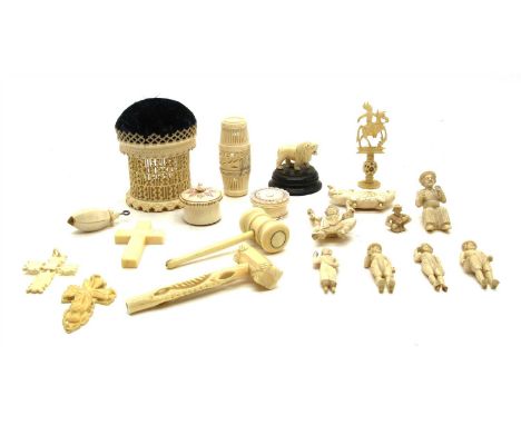 A collection of ivory items, to include gavels, Indian miniature figures, a cross, patch boxes, a pierced pin cushion, etc