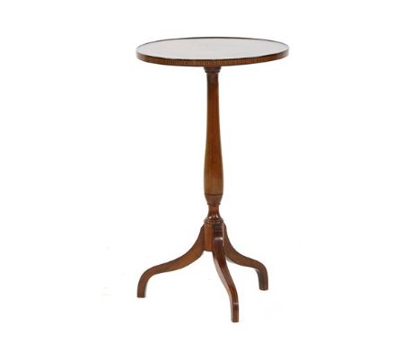 An Edwardian mahogany tripod table, the circular top with a satinwood band, 37cm diameter and an Edwardian mahogany tripod ta