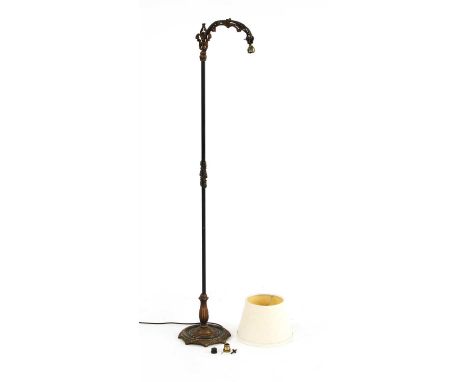 An Art Nouveau style cast metal floor lamp, with foliate detailing, 145cm high