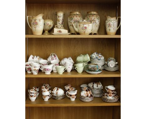 A collection of Crown Devon items to include a pair of baluster shaped vases, a tea pot and other items, and a Sutherland and