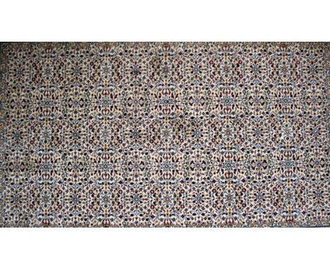 A Central Persian design rug, the camel ground with all over decoration, pale, 233 x 148cm; together with a Chinese carpet, 1