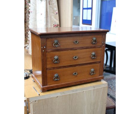 An Edwardian mahogany 3 drawer miniature/table top chest with mother of pearl decoration. 53cm(w) 41cm(h)