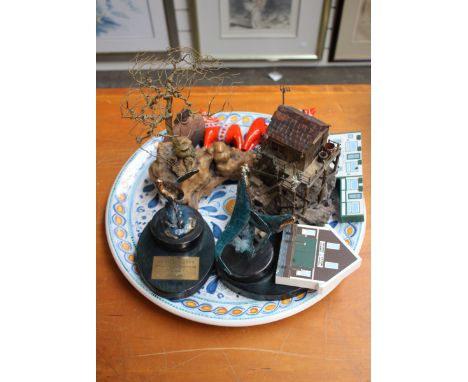 A large Majolica style charger by Caltagirone, two models of blue whales on plinths and a wire model of a bonsai on hard wood