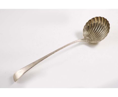 A GEORGE III FEATHER-EDGE SOUP LADLE with a fluted shell bowl, initialled and crested, by Thomas & William Chawner, London 17