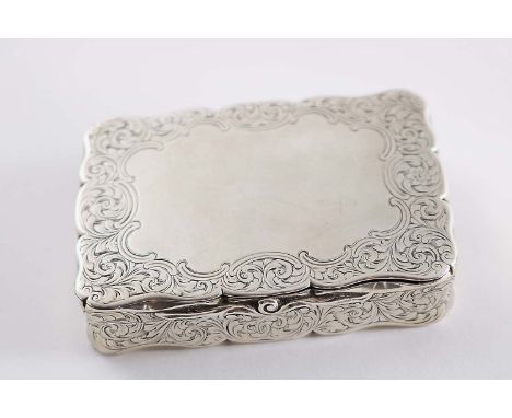 A VICTORIAN ENGRAVED SNUFF BOX of shaped rectangular outline with a scroll thumbpiece and a vacant cartouche on the cover, by
