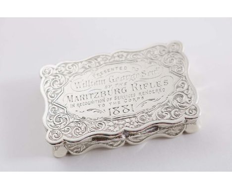 REGIMENTAL INTEREST (BOER WAR):- A Victorian engraved snuff box of shaped rectangular outline with a gilt interior, the cover