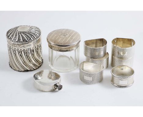 A MIXED LOT:- A set of four engine-turned napkin rings, two other napkin rings, a contemporary scent flask, a late Victorian 