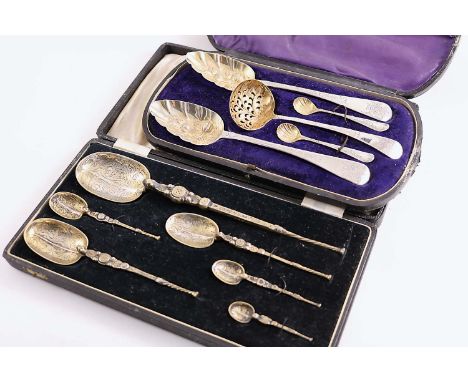 A CASED SET OF SIX GRADUATED SILVERGILT COPIES OF THE CORONATION ANNOINTING SPOON, maker's mark "MM&Co", Birmingham 1936 and 