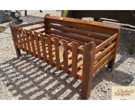 A wrought iron fire grate 