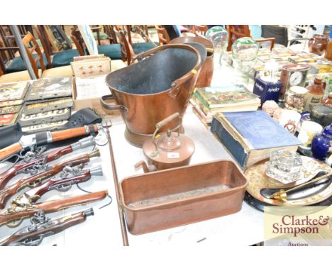 A copper coal scuttle; a copper planter; toasting fork and a copper kettle