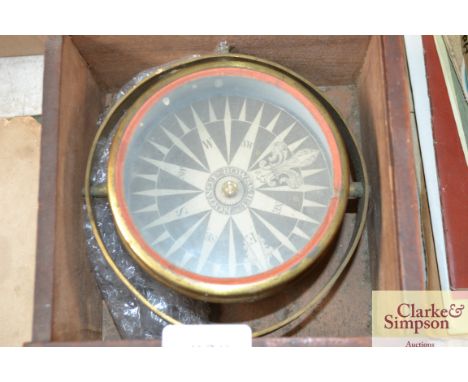 A Bowskill of London brass gimbaled compass