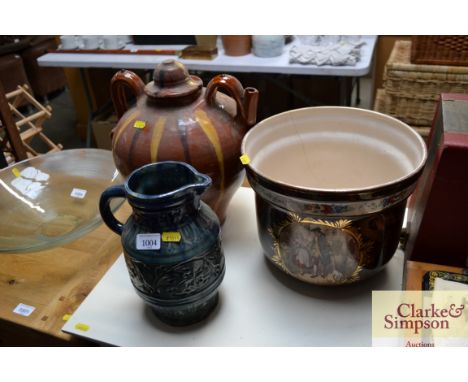 A 19th Century Castle Hedingham style pottery jug together with an Eastern jar and cover and a large jardiniere decorated wit