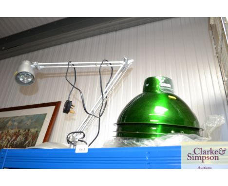 A quantity of industrial light shades together with an Anglepoise style lamp